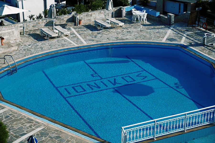 Hotel pool with sunbeds